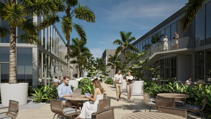 Rendering of the office courtyard at Centtral Aventura with tables and an open stair between floors