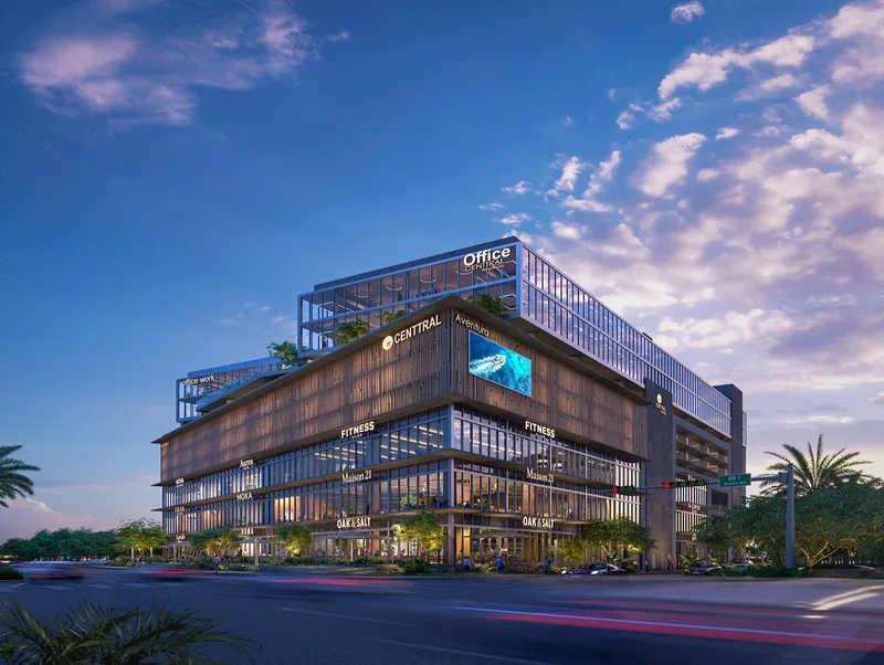 Rendering of Centtral Aventura from Biscayne Boulevard at dusk, storefronts lit
