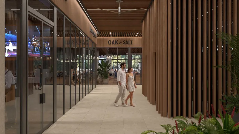 Rendering of a retail corridor lined with glass storefronts at Centtral Aventura