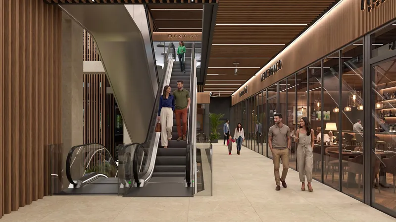 Rendering of an interior retail corridor and escalator at Centtral Aventura