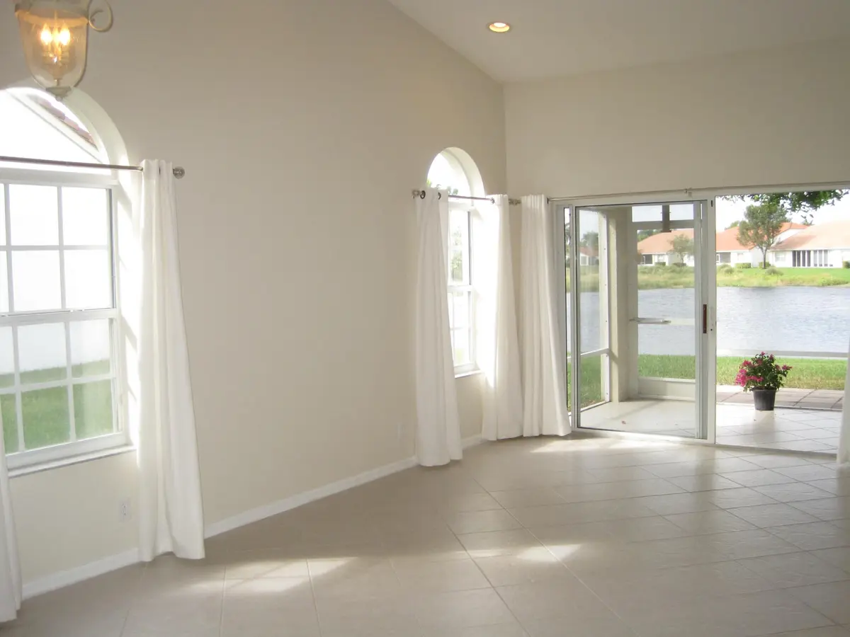 Living Roon with Palladium Windows at 15355 Lake Wisteria Road, Delray Beach