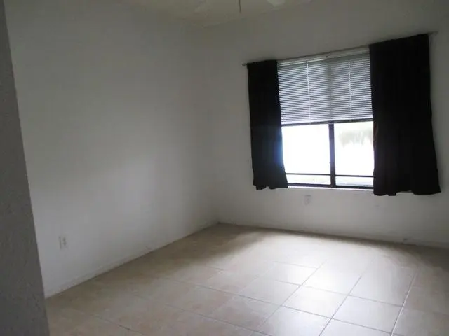 master bedroom at 2812 Grande Parkway 110, Palm Beach Gardens