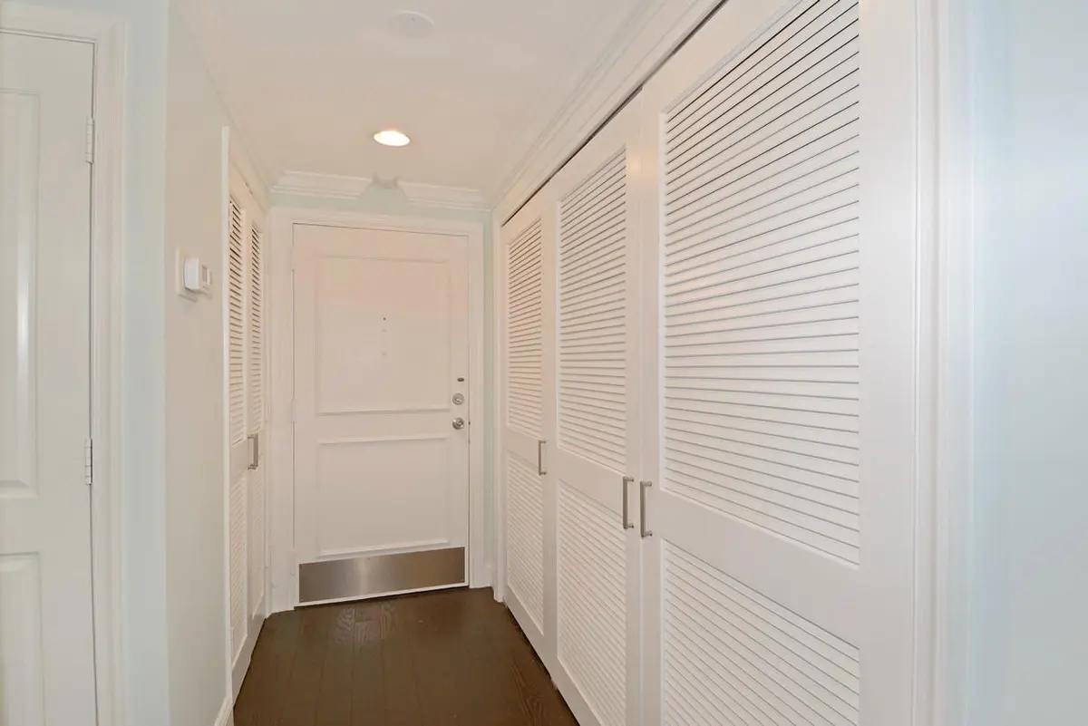Entry hall, storage, washer/dryer closet at 250 Bradley Place 202, Palm Beach