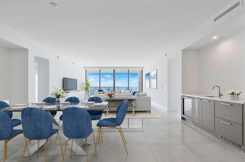 1002 Staged Livingroom and Dining area at 5000 N Ocean Drive 1002, Singer Island
