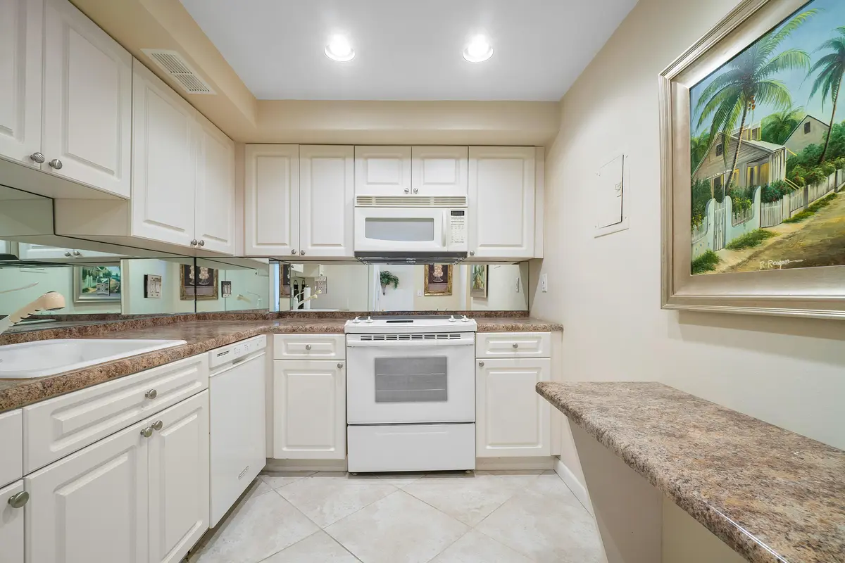 Kitchen w/ Eat-In Bar at 3450 S Ocean Boulevard 625, Palm Beach