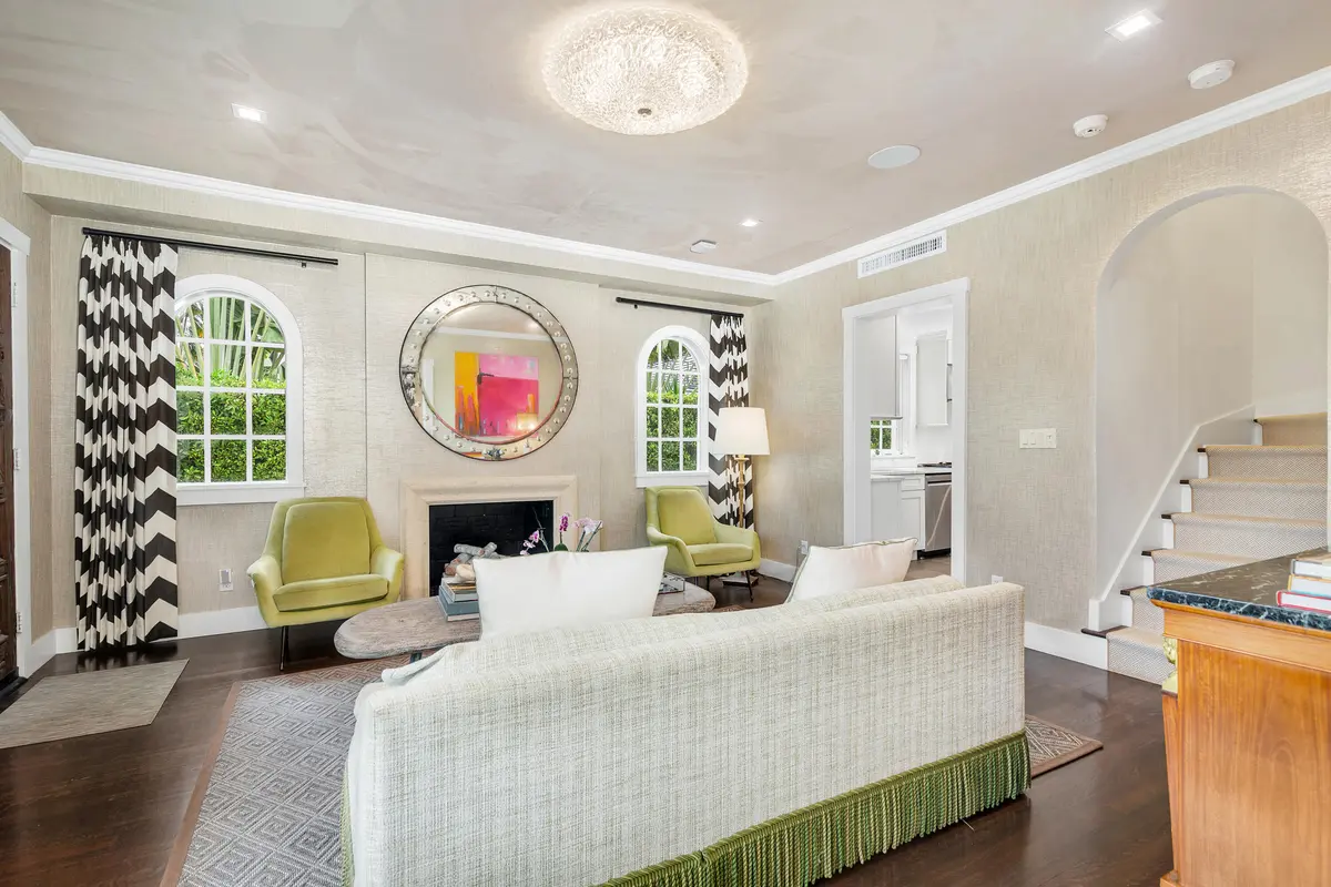 Living room w/ fireplace at 231 Sunset Road, West Palm Beach