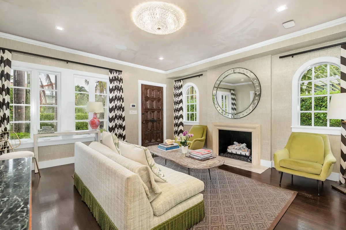 Living room w/ fireplace at 231 Sunset Road, West Palm Beach