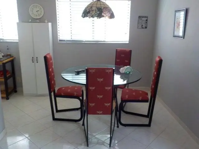Dining off the highly functional kitchen at 15036 Ashland Lane 69, Delray Beach