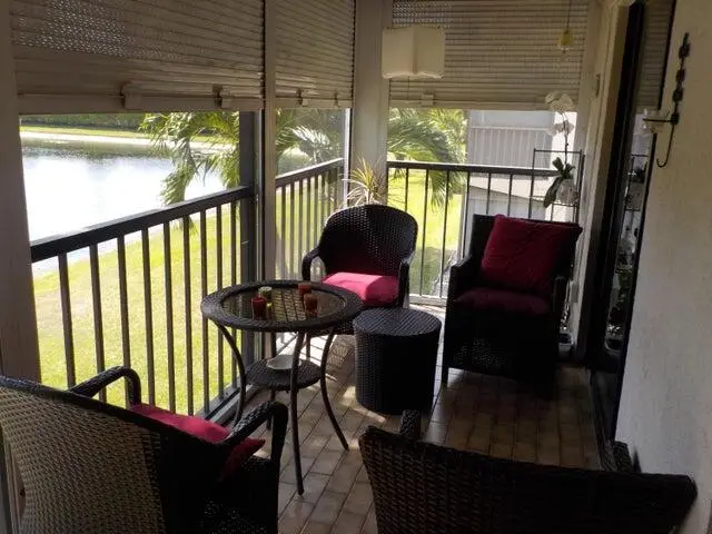 Screen Patio with easy to pull weather p at 15036 Ashland Lane 69, Delray Beach