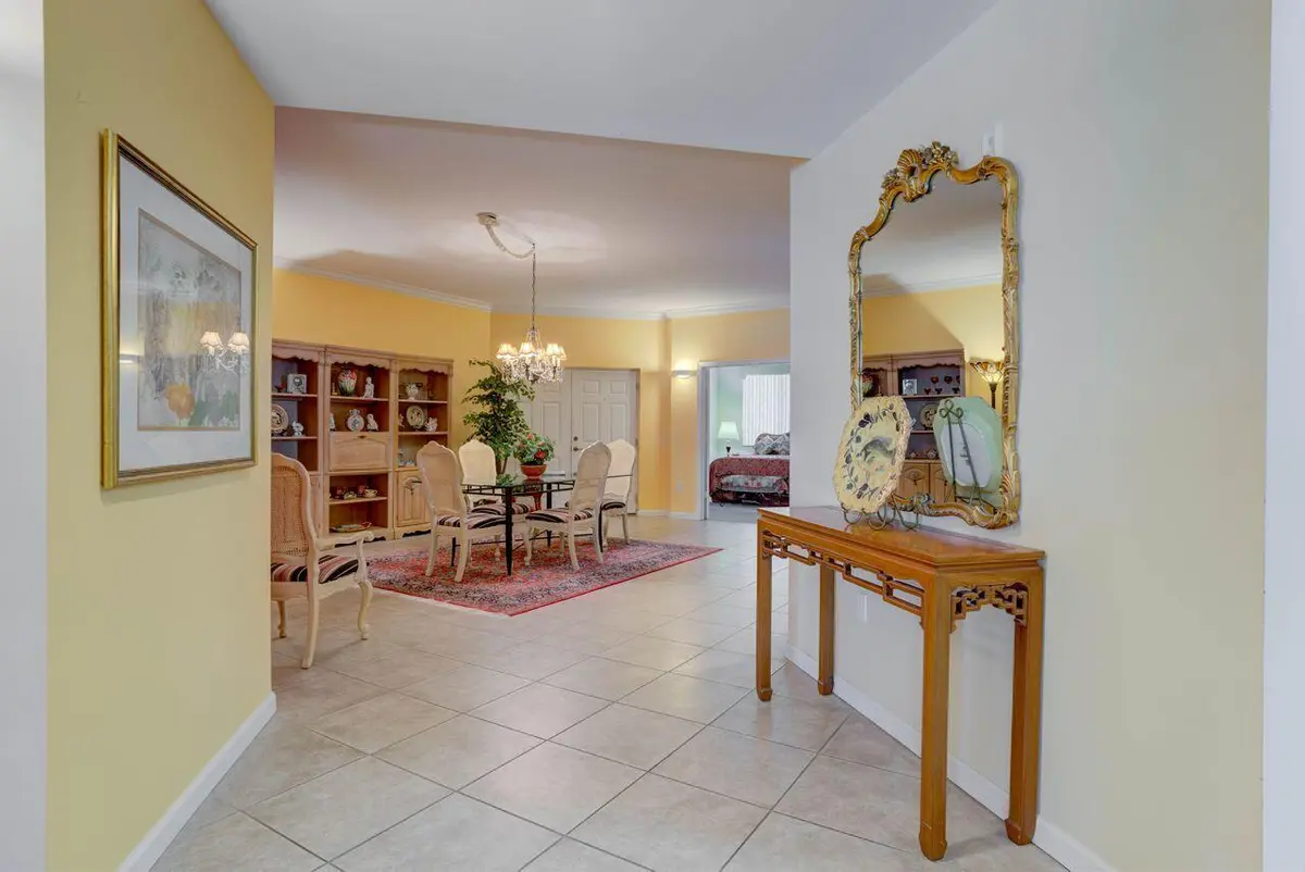 FORMAL DINING TO KITCHEN at 1160 SW Chapman Way 202, Palm City
