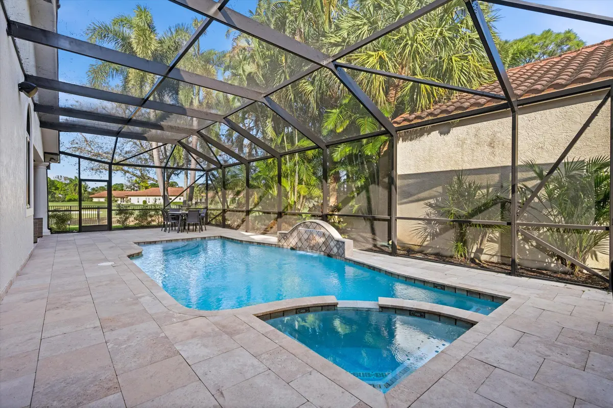 Screened pool/spa and patio at 9445 E Fairway Terrace, West Palm Beach