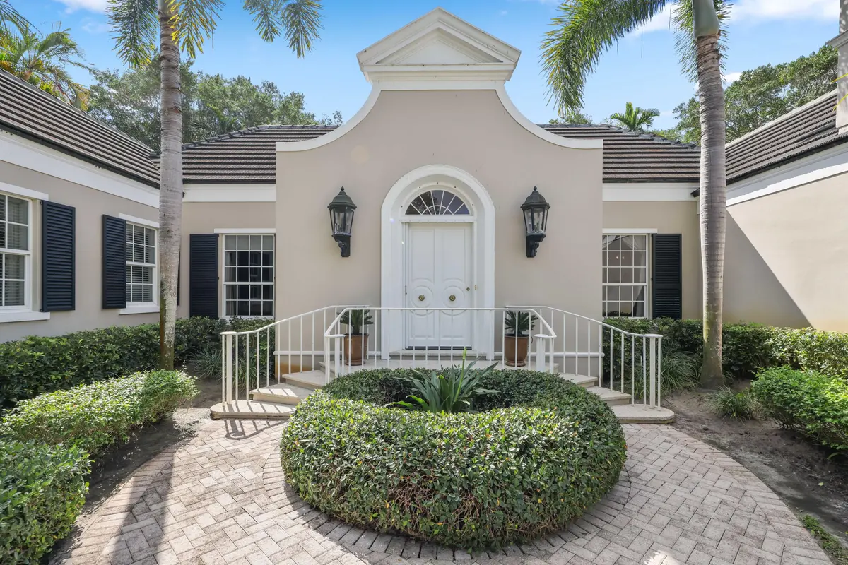 Front Exterior at 26 Country Road, Village of Golf