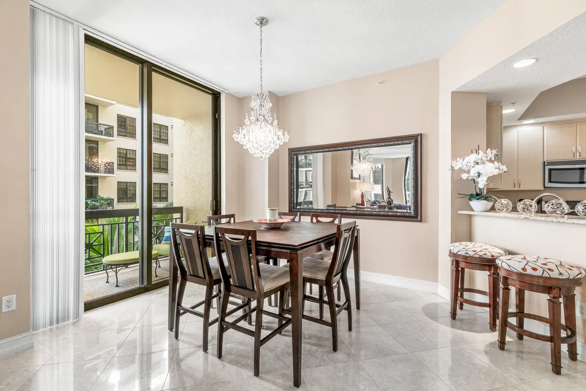 Dining Room w/ Balcony Access at 701 S Olive Avenue 715, West Palm Beach