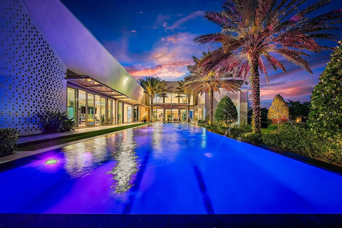 Custom landscape lighting at 8119 Man O War Road, Palm Beach Gardens