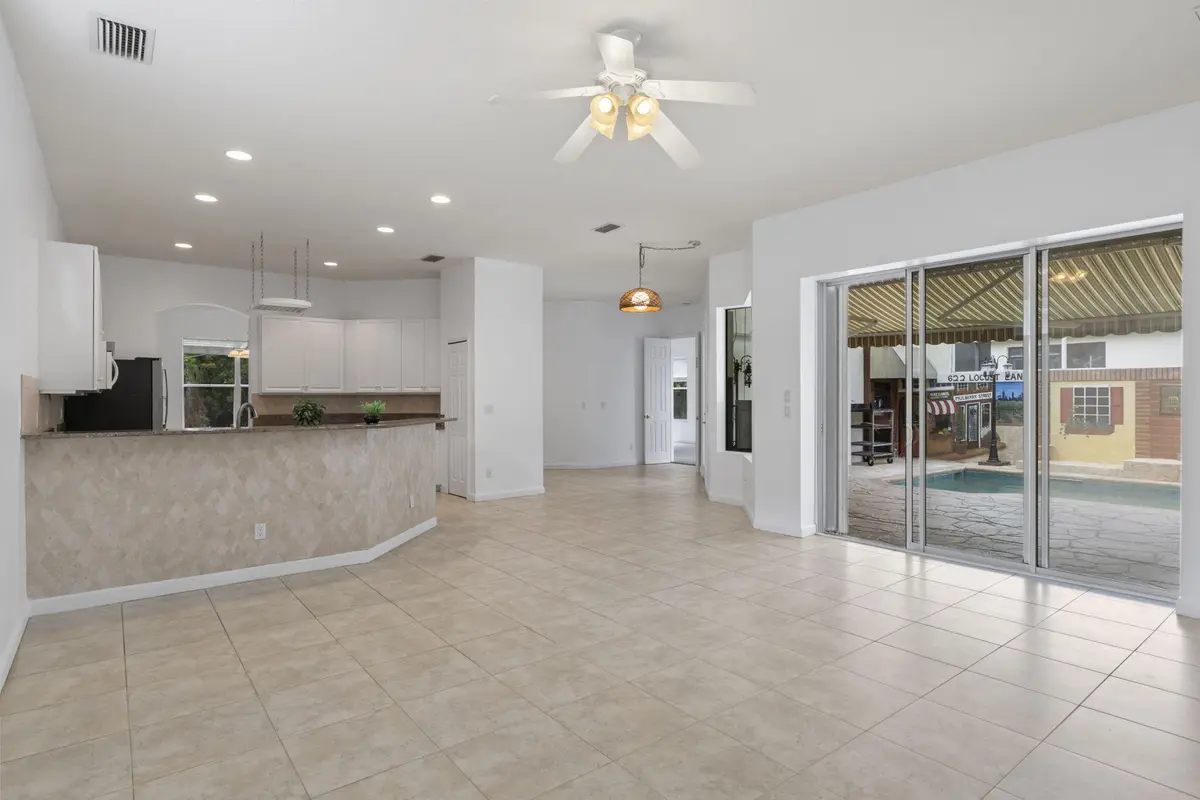 Living room and Kitchen at 731 SW Great Exuma Cove, Port St. Lucie