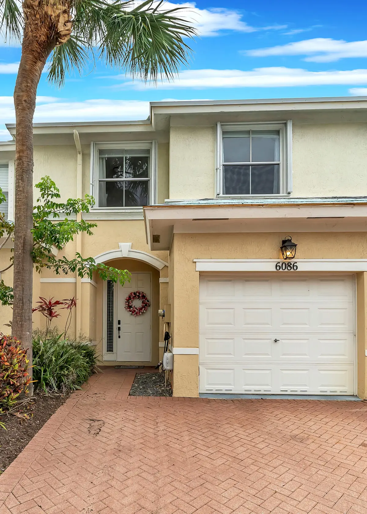 2 Exterior Front (2) at 6086 Seminole Gardens Circle, Riviera Beach