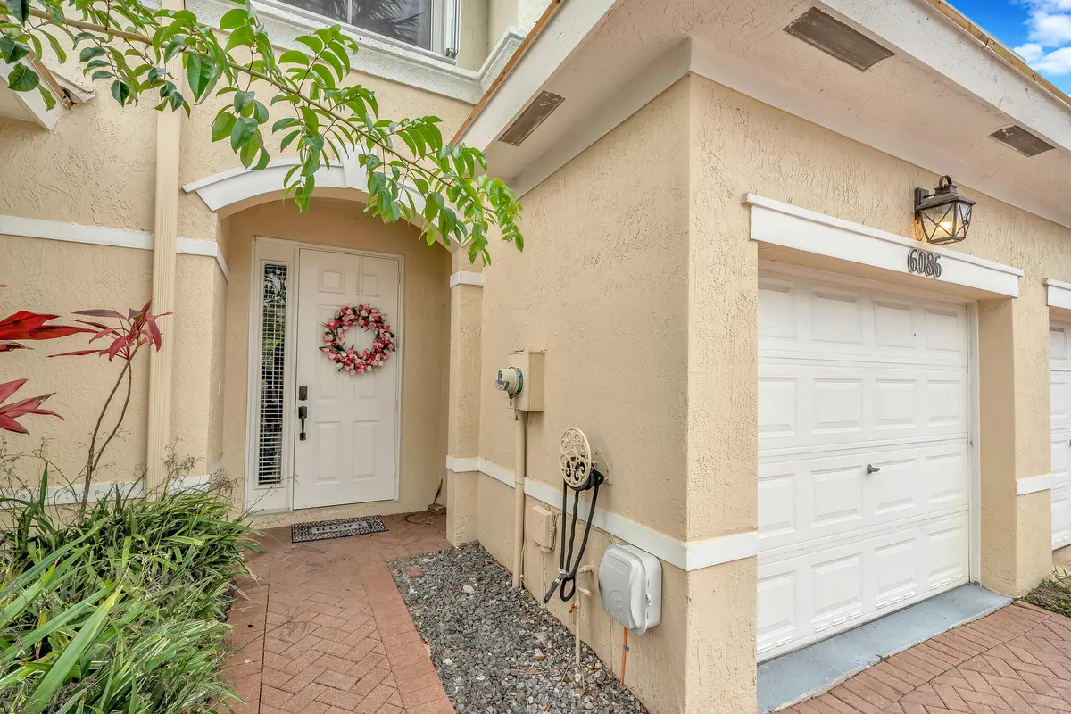 2 Exterior Front (3) at 6086 Seminole Gardens Circle, Riviera Beach