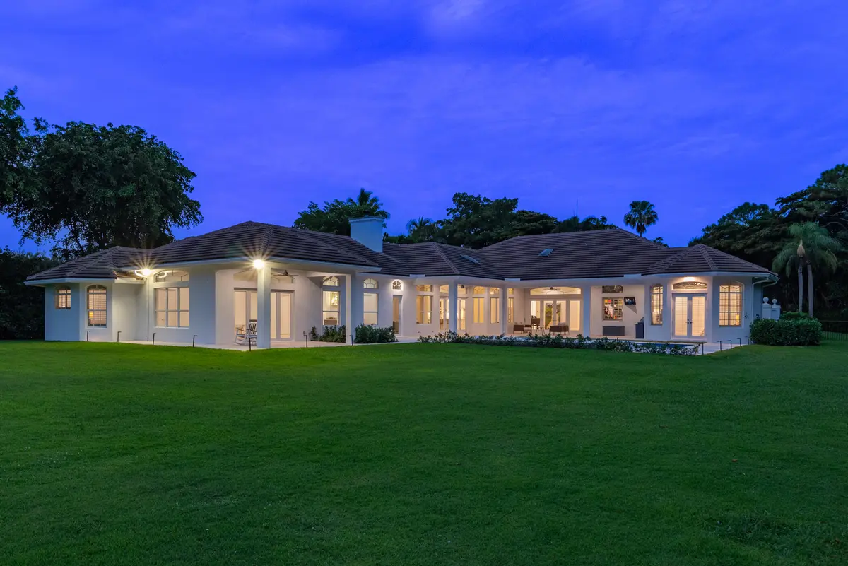 Backyard at Twilight at 8246 Man O War Road, Palm Beach Gardens