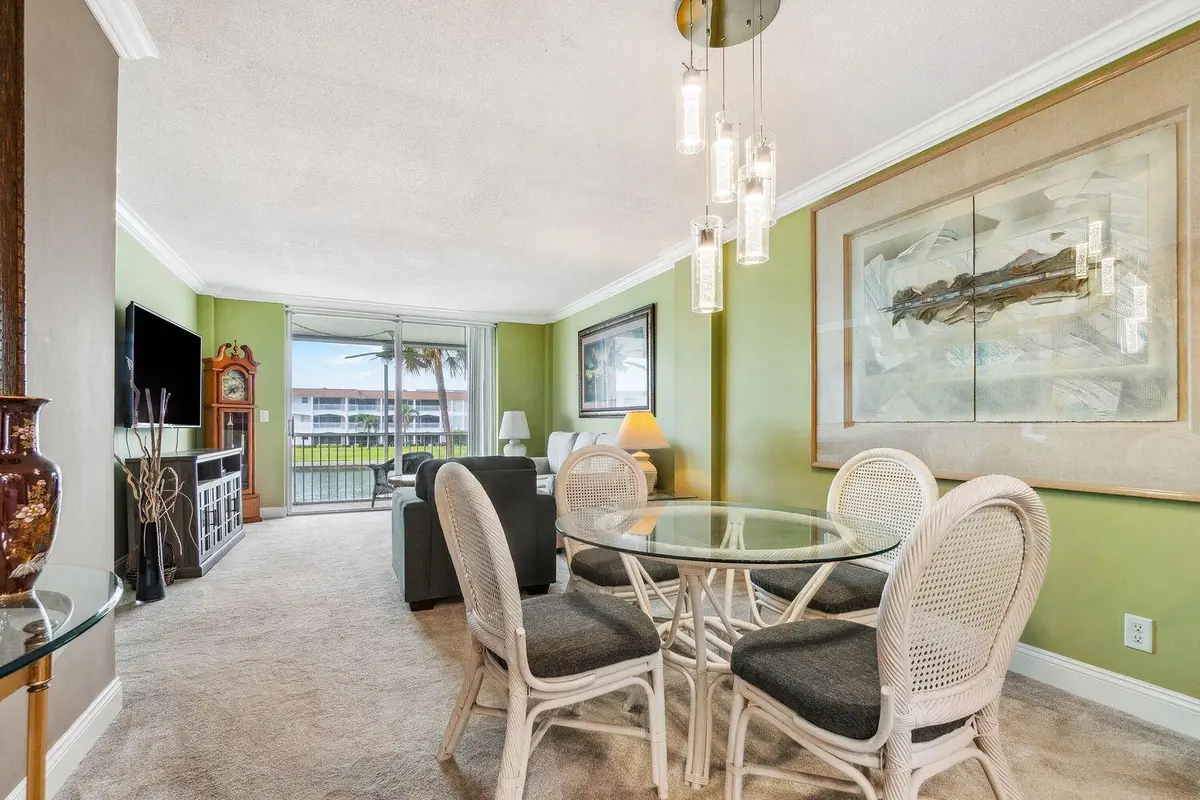 Dining/Living Area at 100 Paradise Harbour Boulevard 208, North Palm Beach
