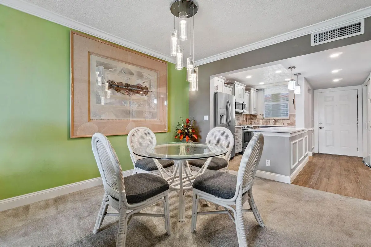 Dining Area at 100 Paradise Harbour Boulevard 208, North Palm Beach