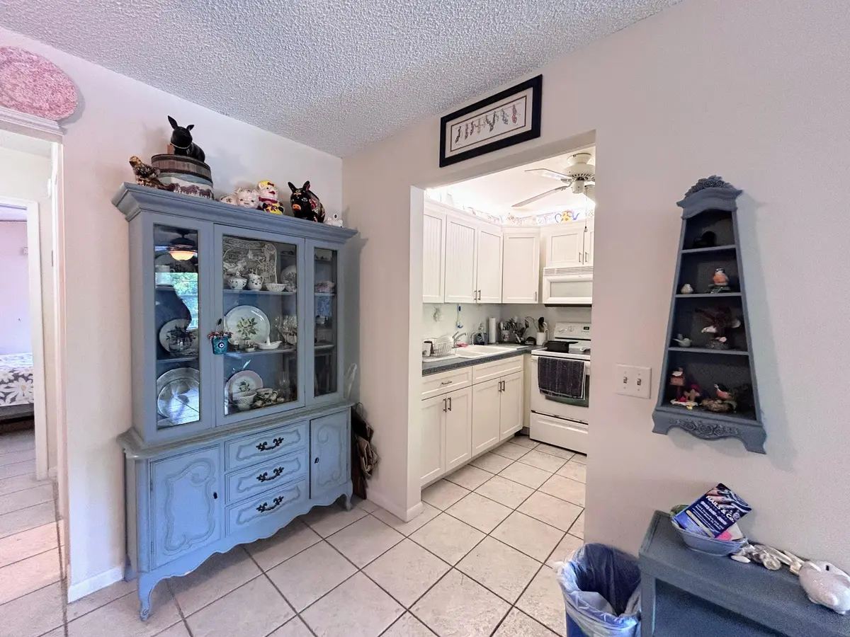 DINING AREA TO KITCHEN at 340 Horizons W 203, Boynton Beach