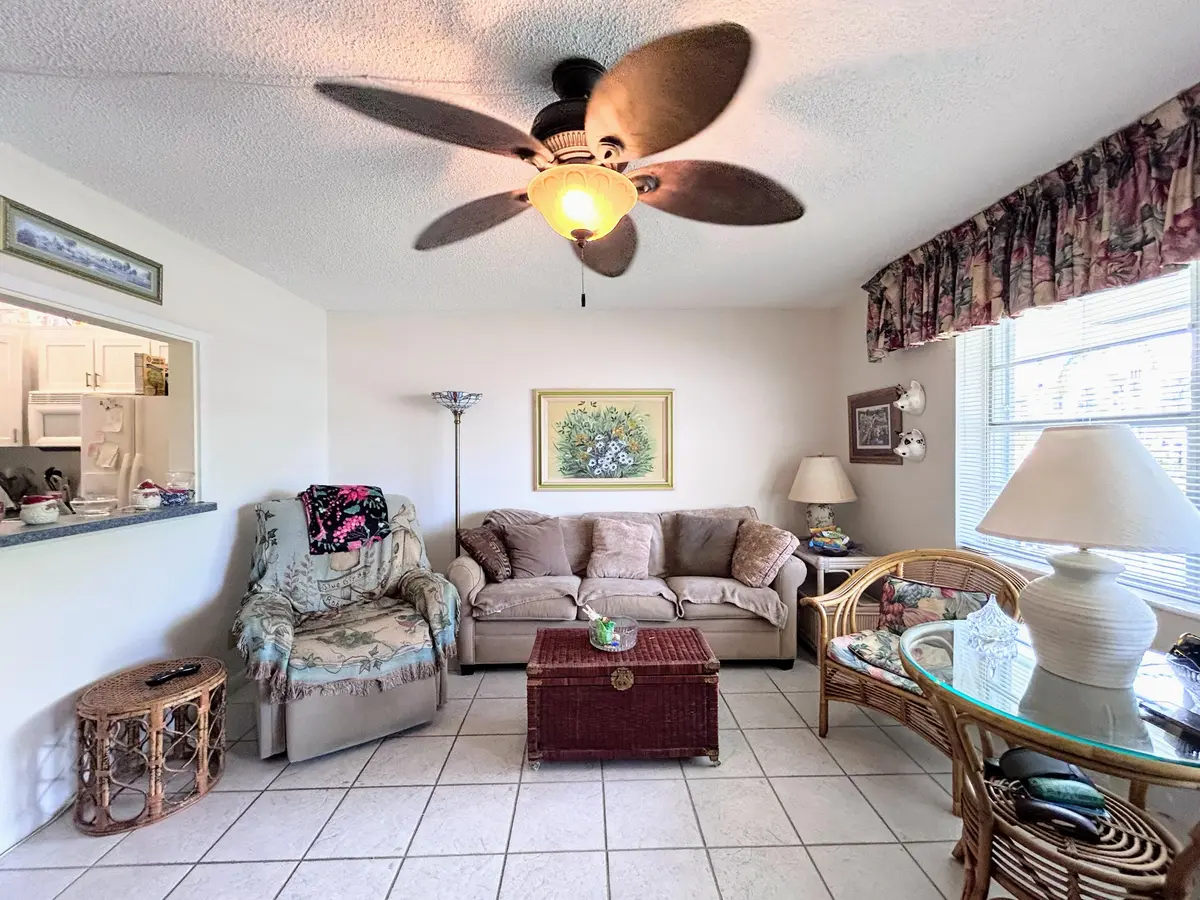 LIVING ROOM/PASS THRU TO KITCHEN at 340 Horizons W 203, Boynton Beach