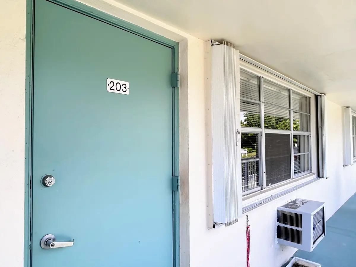 FRONT DOOR/HURRICANE SHUTTERS at 340 Horizons W 203, Boynton Beach