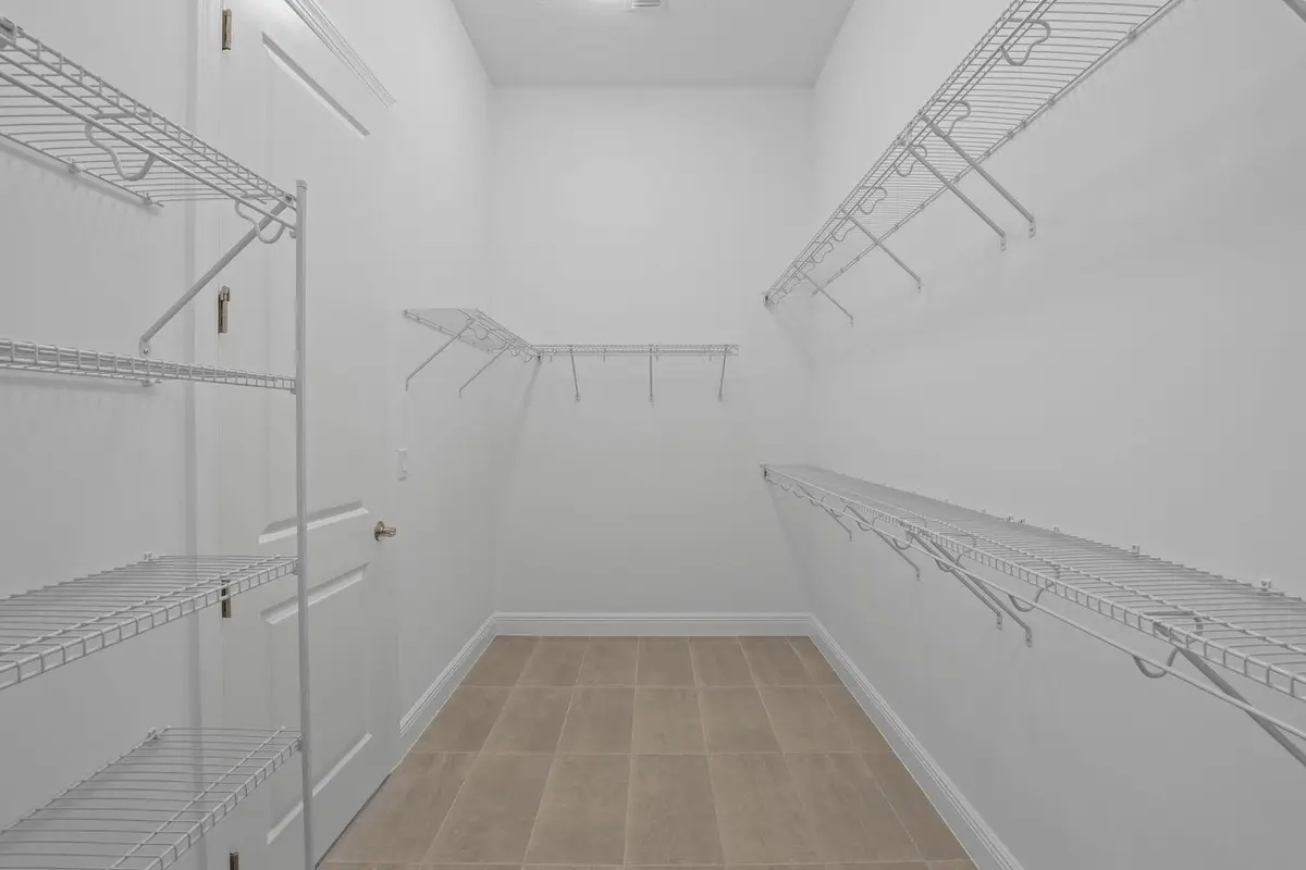 Owner's Walk-in closet at 5385 Hutchinson Way, The Acreage