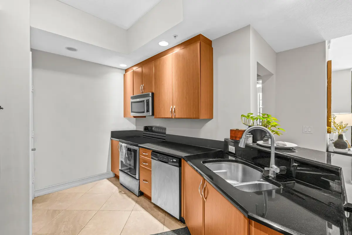 Kitchen w/ Ample Storage & Counters at 701 S Olive Avenue 1213, West Palm Beach