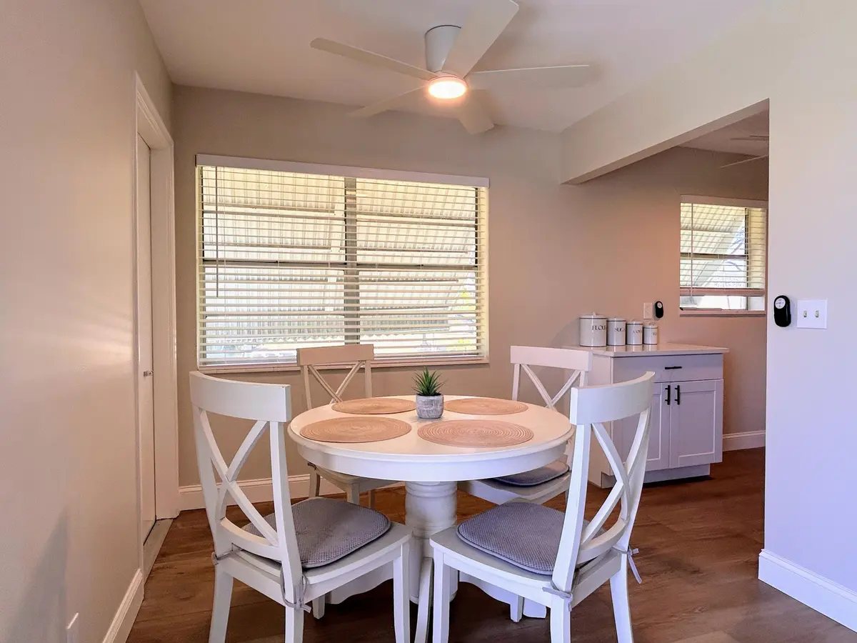 Dining area to kitchen at 620 Horizons W 201, Boynton Beach