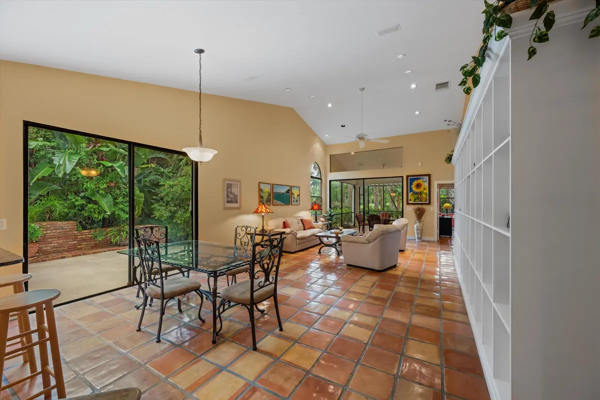 Dining Rm overlooks open patio at 1535 Fairway Terrace, West Palm Beach