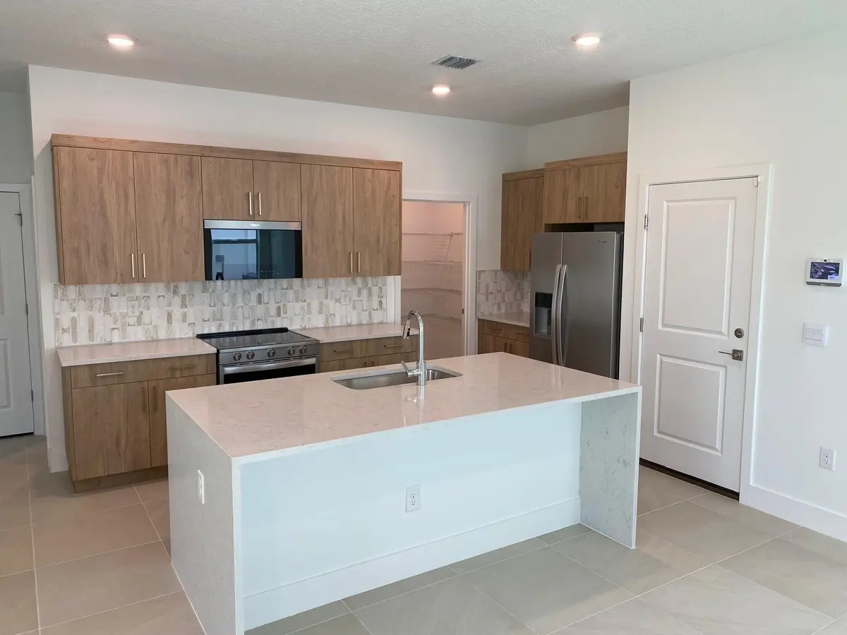 PPT 70 Kitchen at 7011 SE Park Trace Drive, Stuart