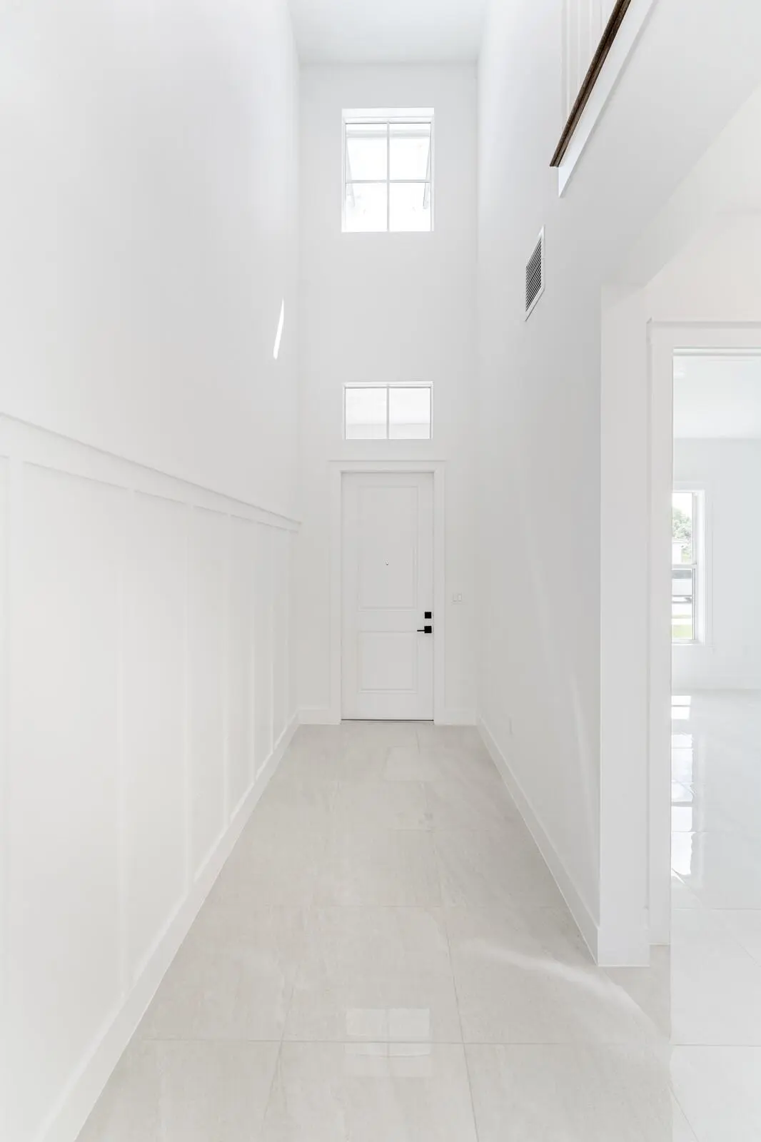 Foyer with Volume Ceiling at 6782 SE Lost Pine Drive 27, Stuart