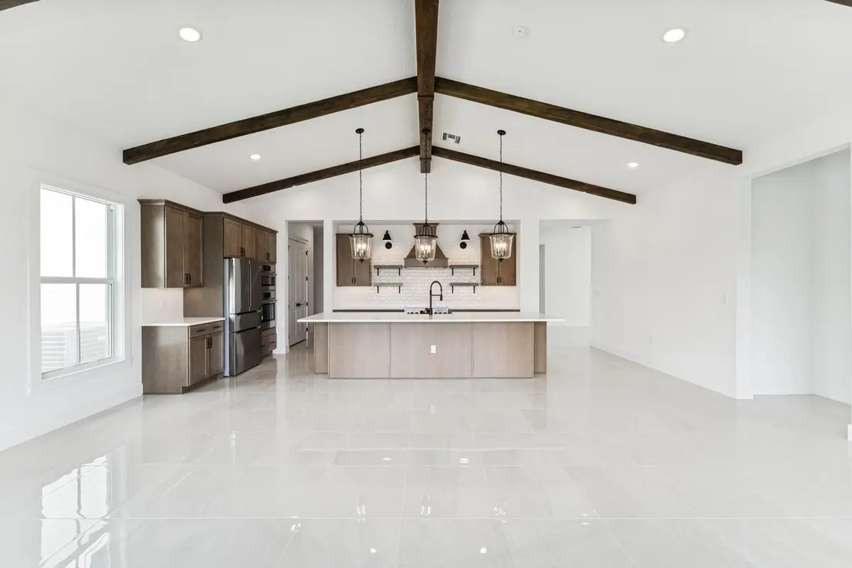 Kitchen, Great Room & Dining Area at 6782 SE Lost Pine Drive 27, Stuart