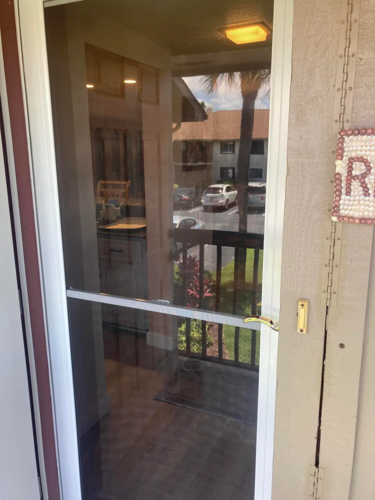 Storm Door at 1600 SE Dixie Highway 13-204, Jensen Beach
