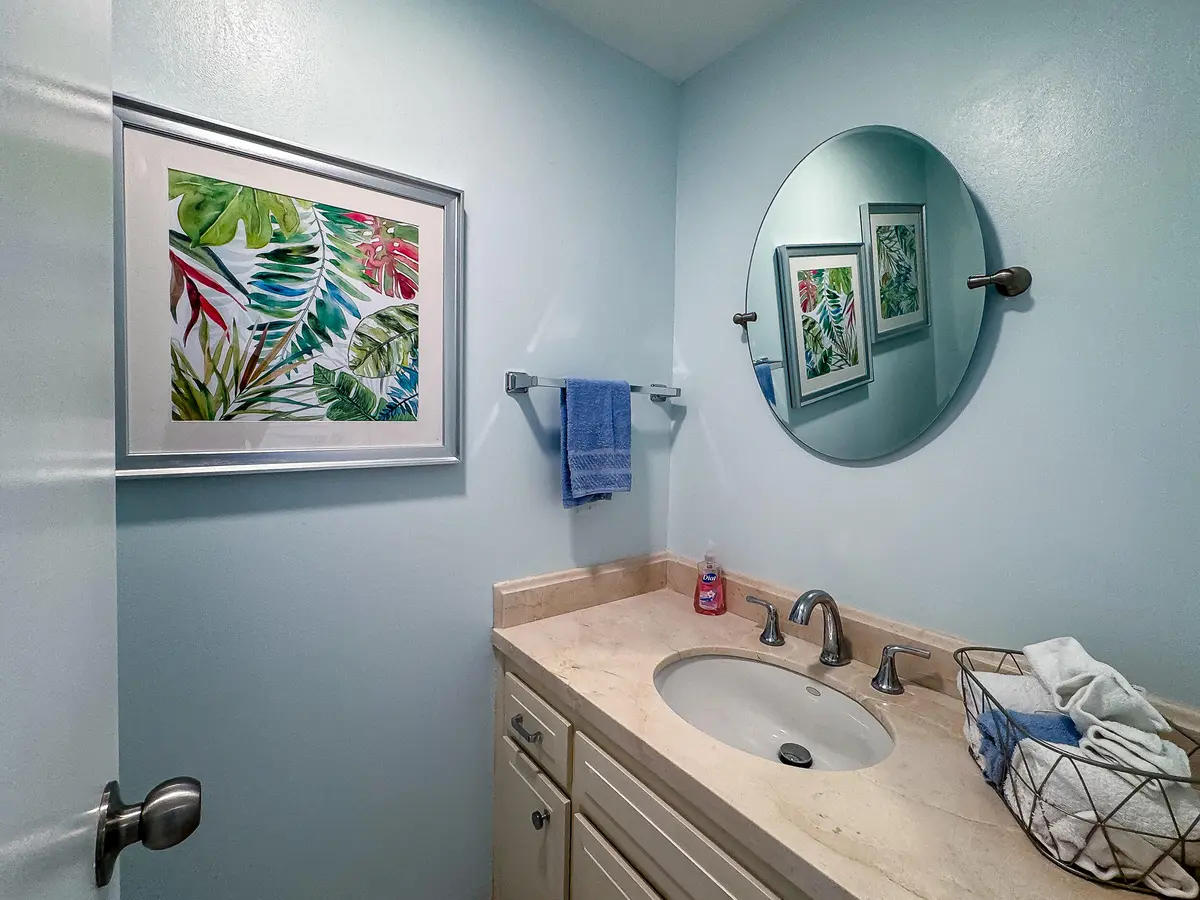 Powder Room In Foyer at 50 East Road 5c, Delray Beach
