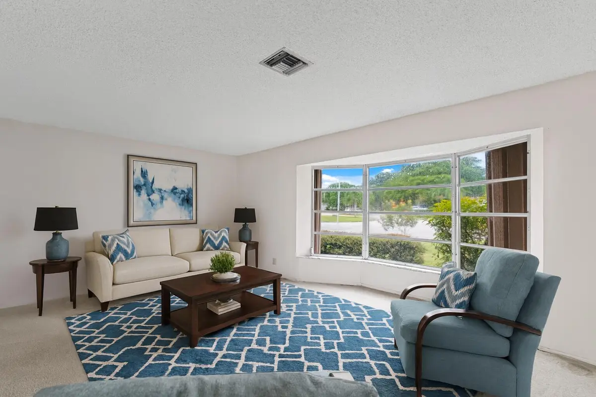 Living Room - Staged at 8675 NW 28th Drive, Coral Springs