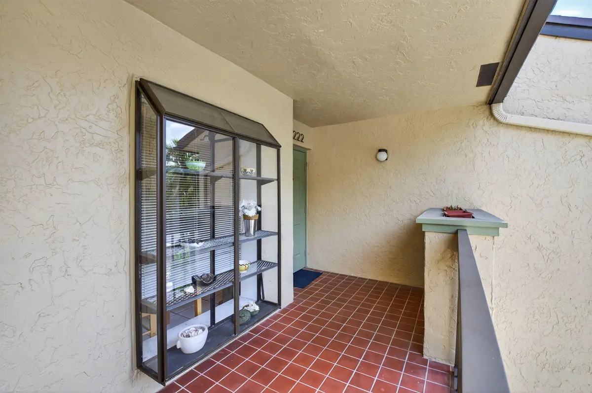 covered exterior walk way at 5055 Oak Hill Lane 222, Delray Beach