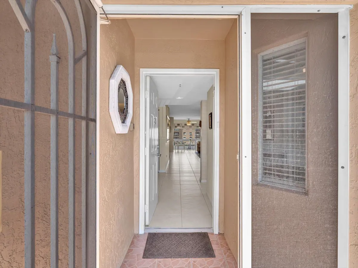 Screened Front Entrance at 12565 Imperial Isle Drive 301, Boynton Beach