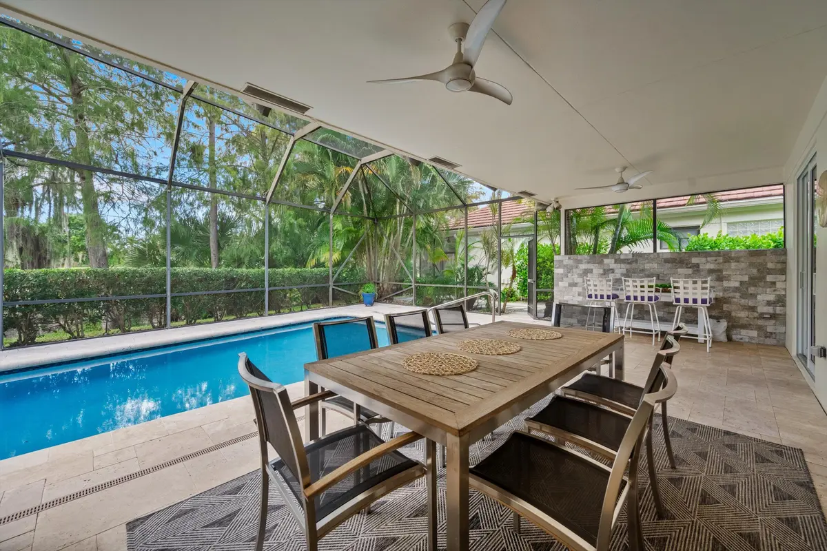 Cover patio + screened pool at 1797 Gulfstream Way, West Palm Beach