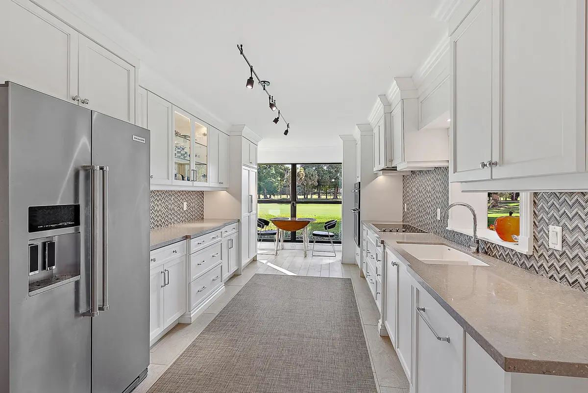 Kitchen to 9th Hole at 16648 Traders Crossing 106, Jupiter
