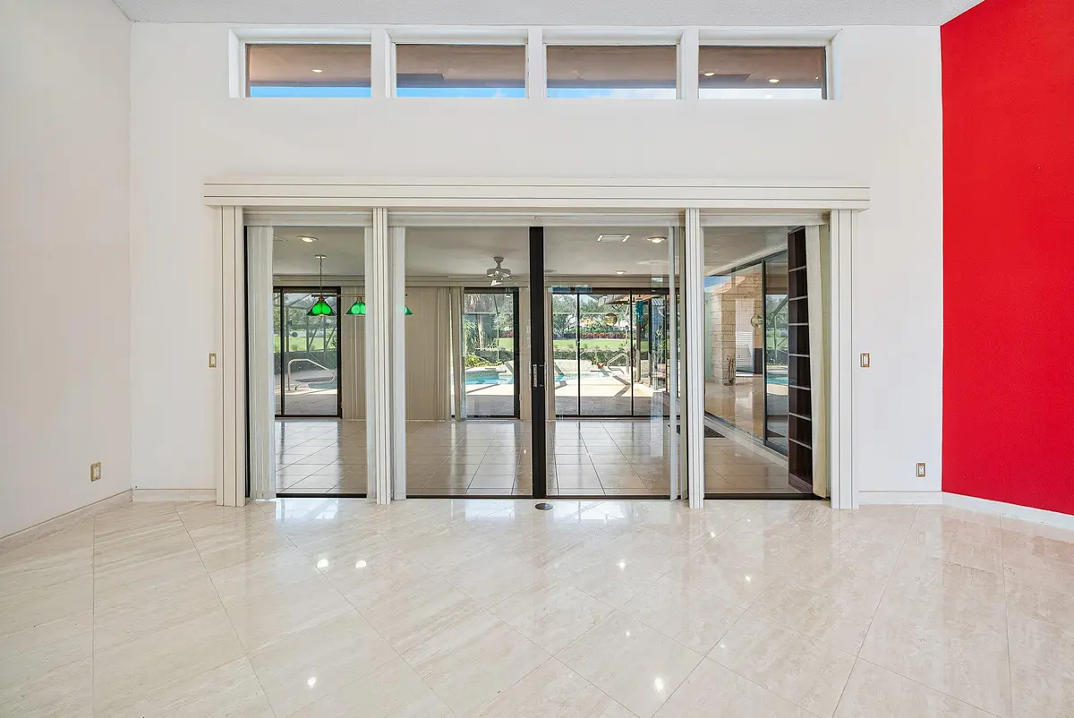 Living room to Florida room at 4952 Bocaire Boulevard, Boca Raton