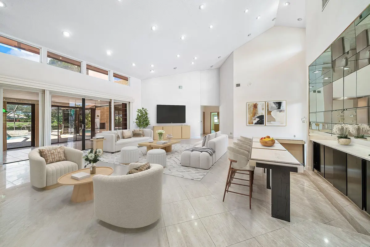 Living room (virtual staging) at 4952 Bocaire Boulevard, Boca Raton