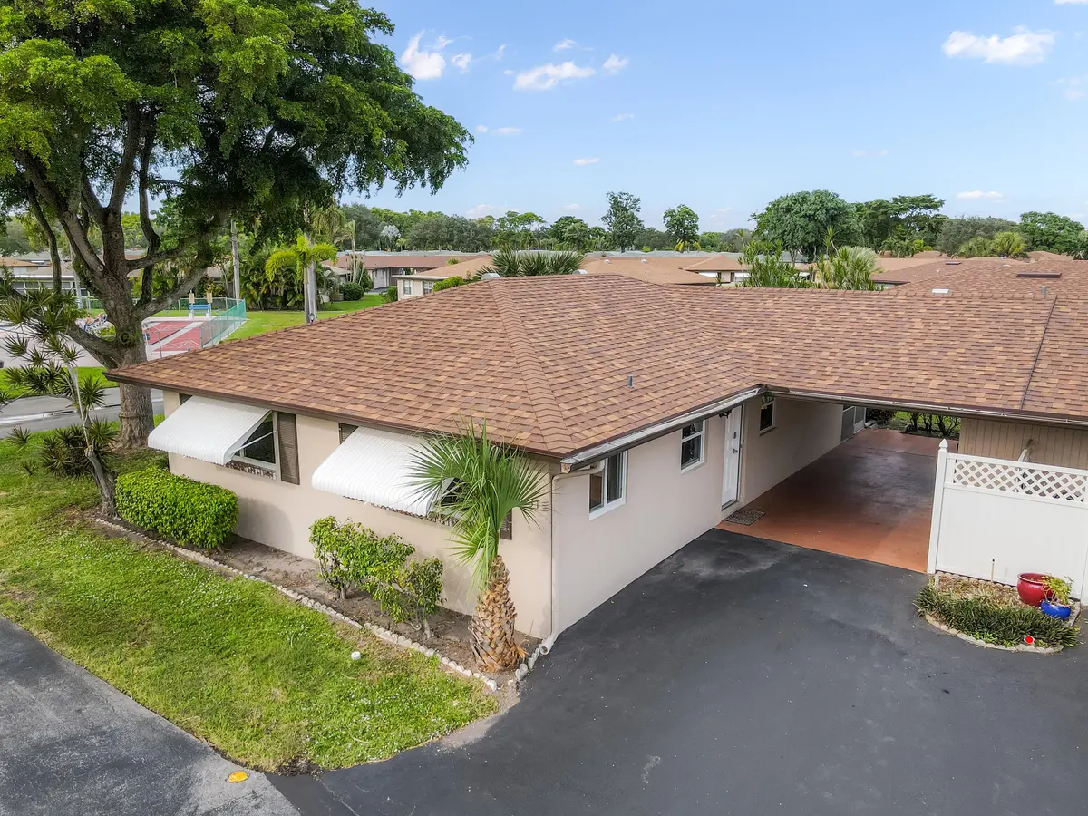 Front of Home/Carport at 131 Mockingbird Lane, Delray Beach