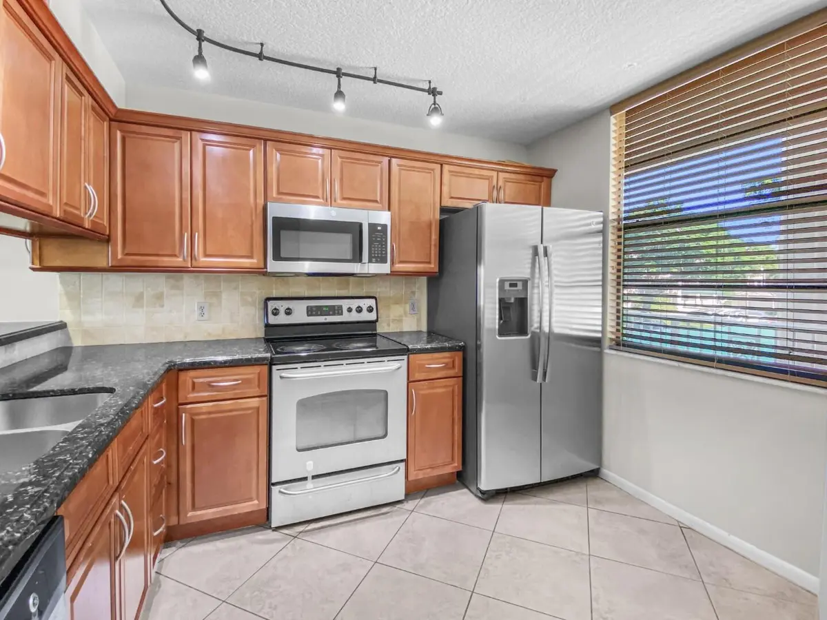 3520 Whitehall 203 Kitchen 3 BB (Large) at 3520 Whitehall Drive 203, West Palm Beach