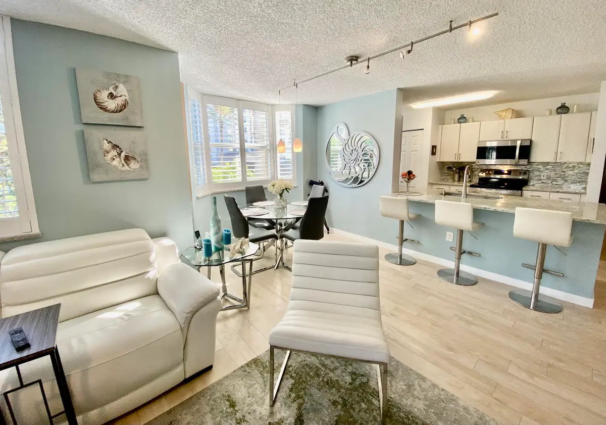 Kitchen Living Dining at 3594 S Ocean Boulevard 207, Highland Beach