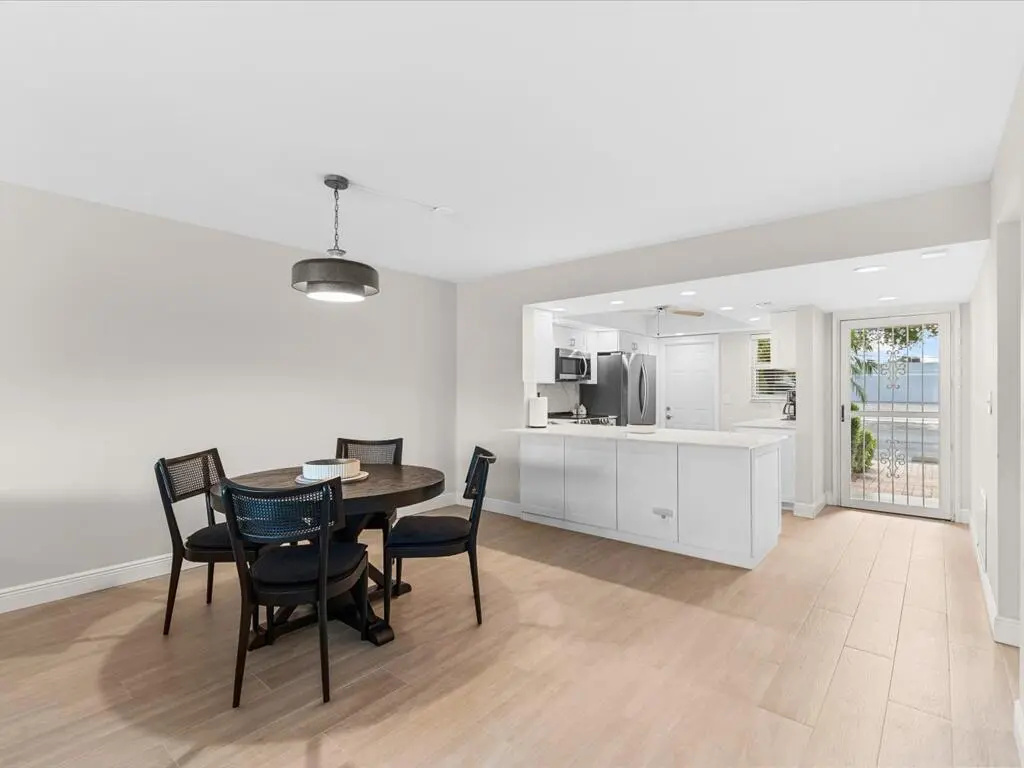 Kitchen and Dining room at 3111 NE 51st Street 101c, Fort Lauderdale