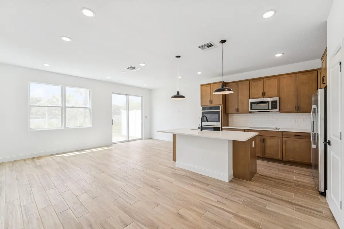 Dining Area, Great Room & Kitchen at 177 SE Birch Terrace 0737, Stuart