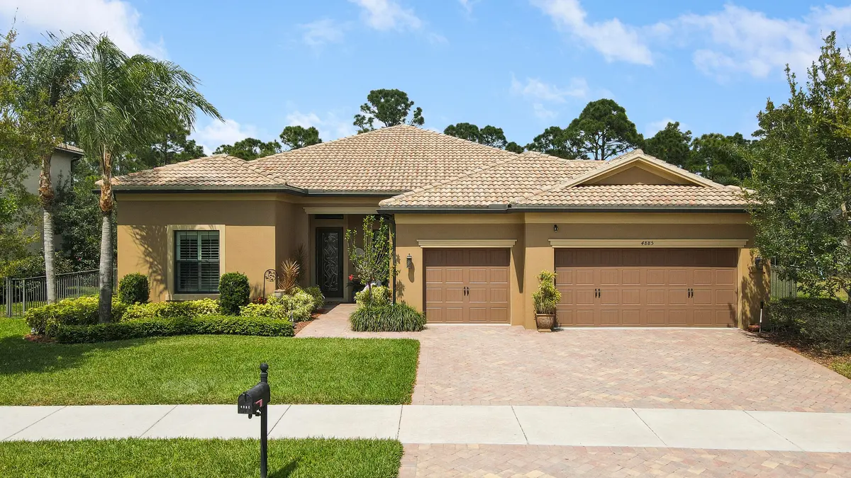 Front Exterior at 4885 SW Gossamer Circle, Palm City