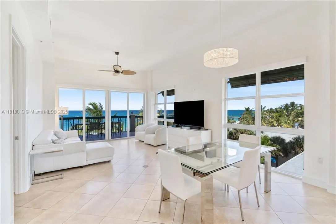 Livingand dining room at 4444 El Mar Drive 3401, Lauderdale-By-The-Sea